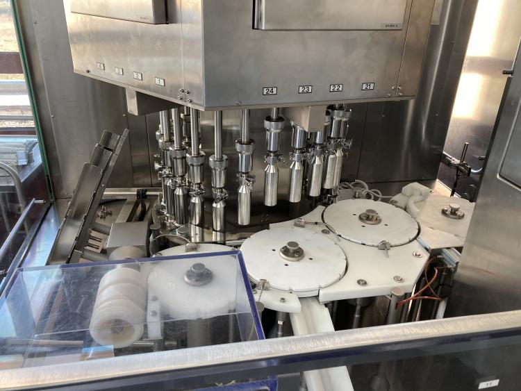 Machine de détection de micro-fuites pour ampoules par le vide