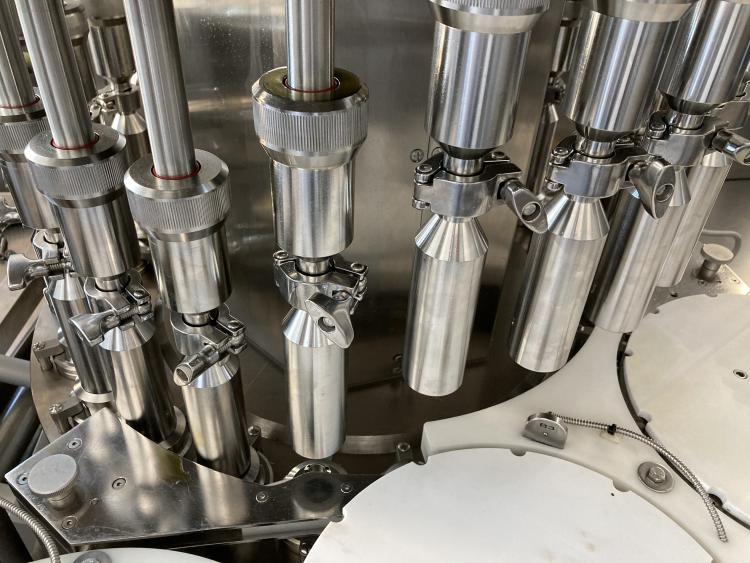 Machine de détection de micro-fuites pour ampoules par le vide