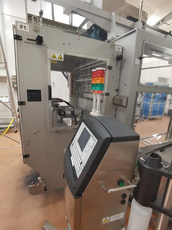 Ligne sachet poudre Schmucker Tenax 8L + encartonneuse Bergami AS 200 L